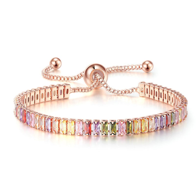 "Elegant justerbart zirkonarmband i rosguld/silver med glidspänne, flerfärgade zirkoner och boxkedja."