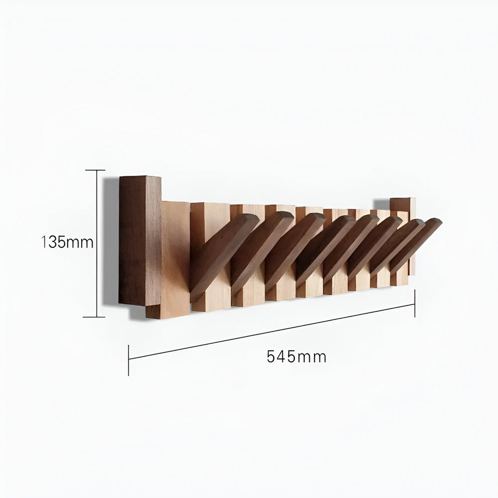 Träklädhängare med innovativ pianodesign. En modern hallmöbel och praktisk förvaringskrok för inredning.