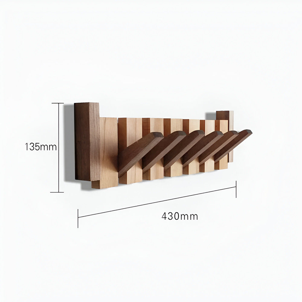 Modern och praktisk klädhängare för hallen. Unik pianodesign som förhöjer inredningen och ger förvaring.