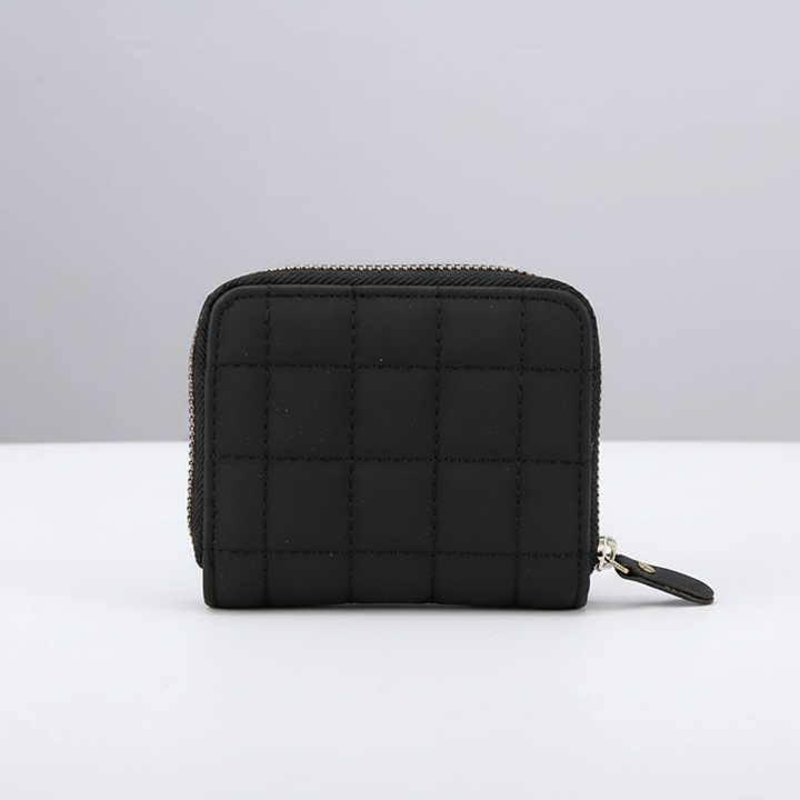 Liten och elegant damplånbok i PU-läder. Kompakt korthållare med myntfack, idealisk accessoar för kvinnor.