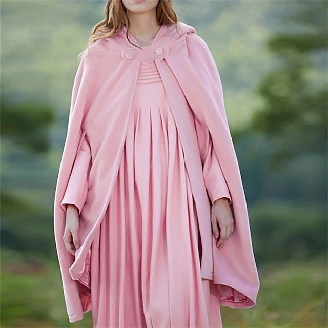 Elegant kort kappa för dam i vintage stil, med praktisk huva. Perfekt för kyliga dagar.