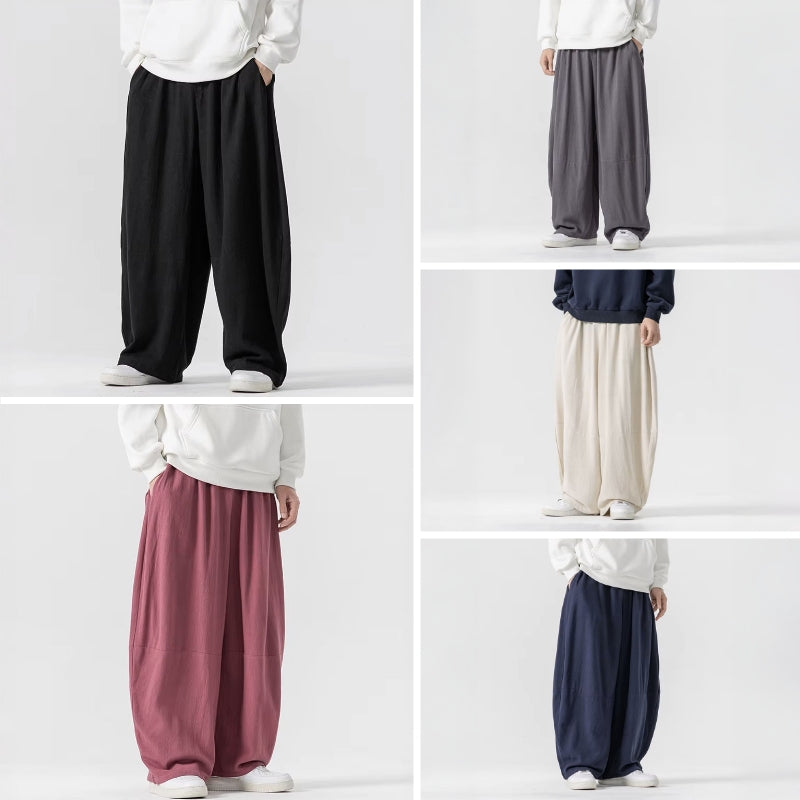 Modefoto av kvinnors vida byxor med hög midja, kombinerat med en crop top för en trendig outfit.