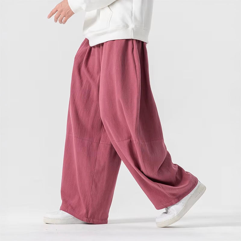 Kvinnobyxa med hög midja och vida ben i en överdimensionerad passform, perfekt för en chic och bekväm stil.