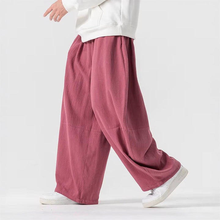 Kvinnobyxa med hög midja och vida ben i en överdimensionerad passform, perfekt för en chic och bekväm stil.