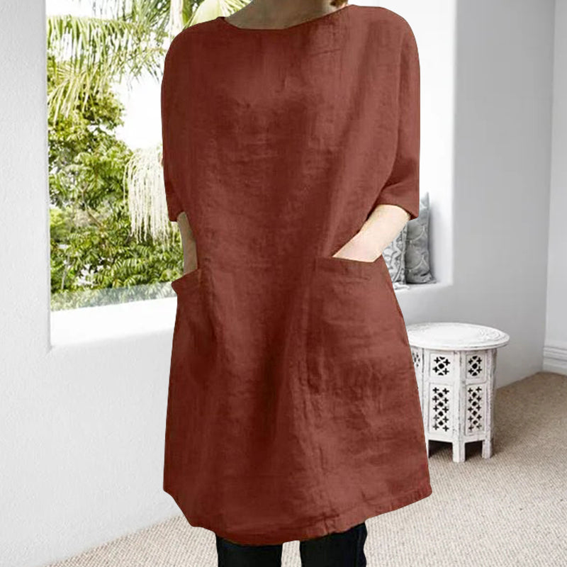 "Elegant kvinnoklänning i bomull-linne, rund hals, knälång, vårig design, drop shoulder ärmar, bekväm passform."
