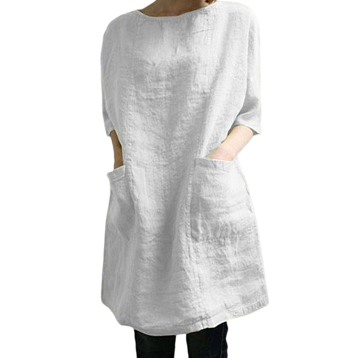 "Elegant kvinnoklänning i bomull-linne, rund hals, knälång, vårig design, drop shoulder ärmar, bekväm passform."