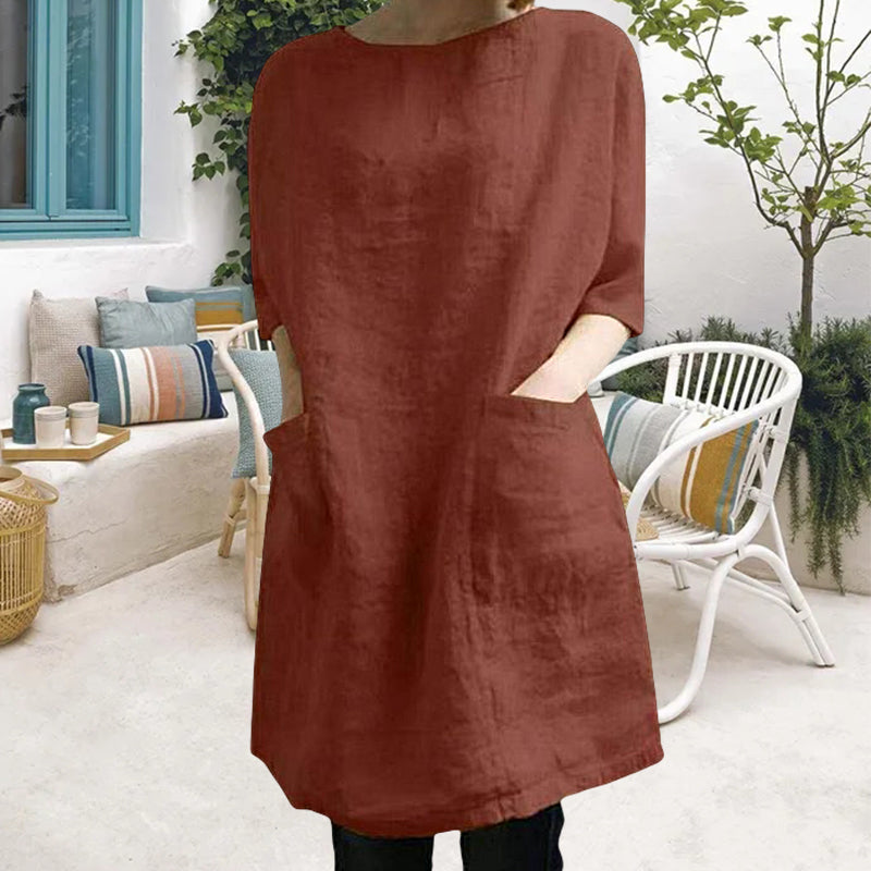 "Elegant kvinnoklänning i bomull-linne, rund hals, knälång, vårig design, drop shoulder ärmar, bekväm passform."