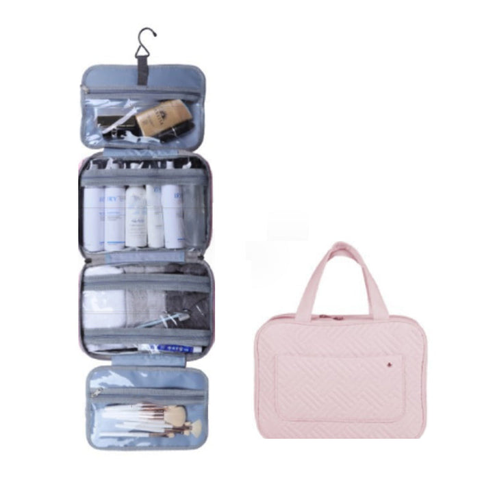 "Elegant kvinnors necessär med 4 fack, hängkrok, mjukt material, svart och rosa färgval, för resor och organisering."