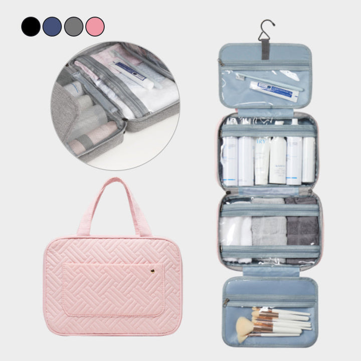 "Elegant kvinnors necessär med 4 fack, hängkrok, mjukt material, svart och rosa färgval, för resor och organisering."
