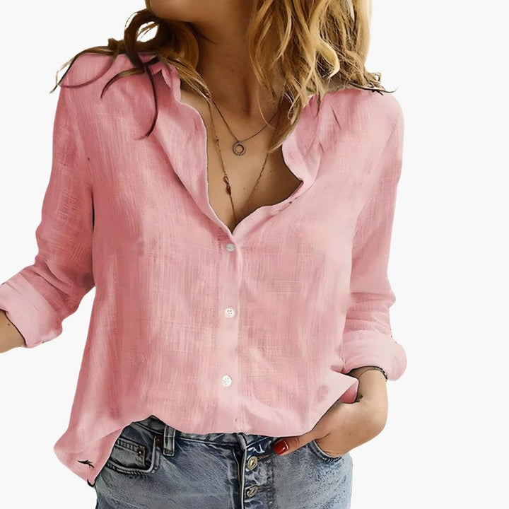 Bekväm och mångsidig långärmad damtopp. Idealisk festblus eller vardagslook för vår och sommar. Elegant och luftig.