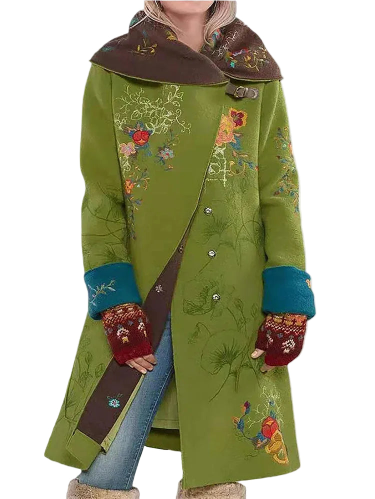 Elegant lång vinterkappa för kvinnor, mörkblå med stilren design och vida slag, perfekt för vardag eller fest.