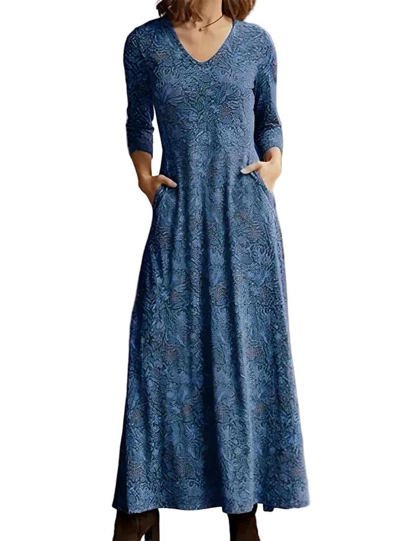 Elegant långklänning med retromönster för dam, perfekt som festklänning eller sommarklänning.