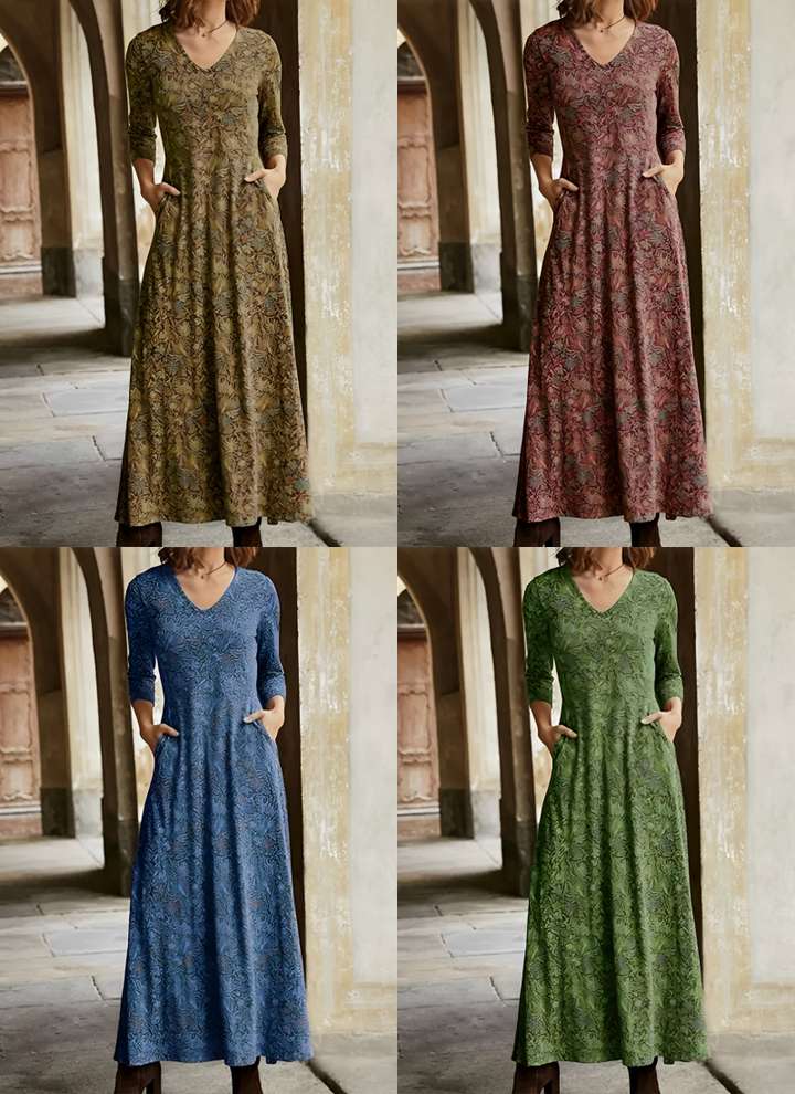 Dam långklänning med vintage-inspirerat retromönster och högmidja, en elegant modeartikel.