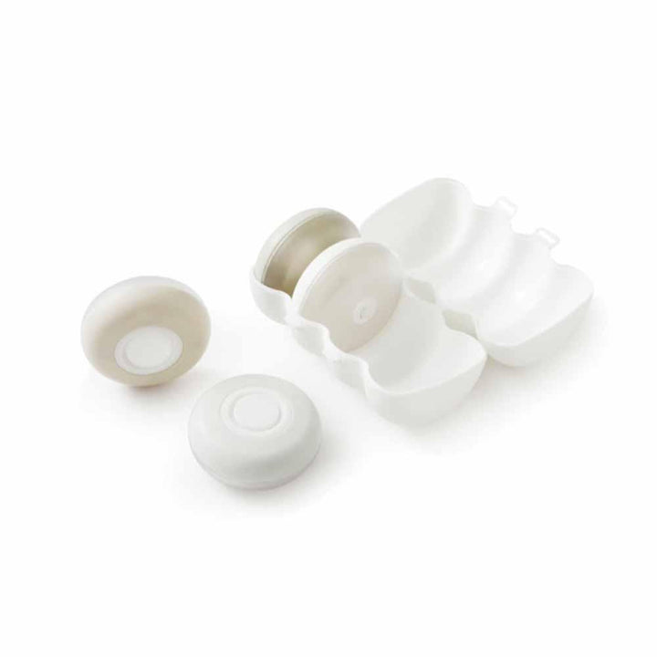 "Elegant läckagesäker reseförpackning, kompakt design, perfekt för handbagage, fyra färger, tillbehör resor."