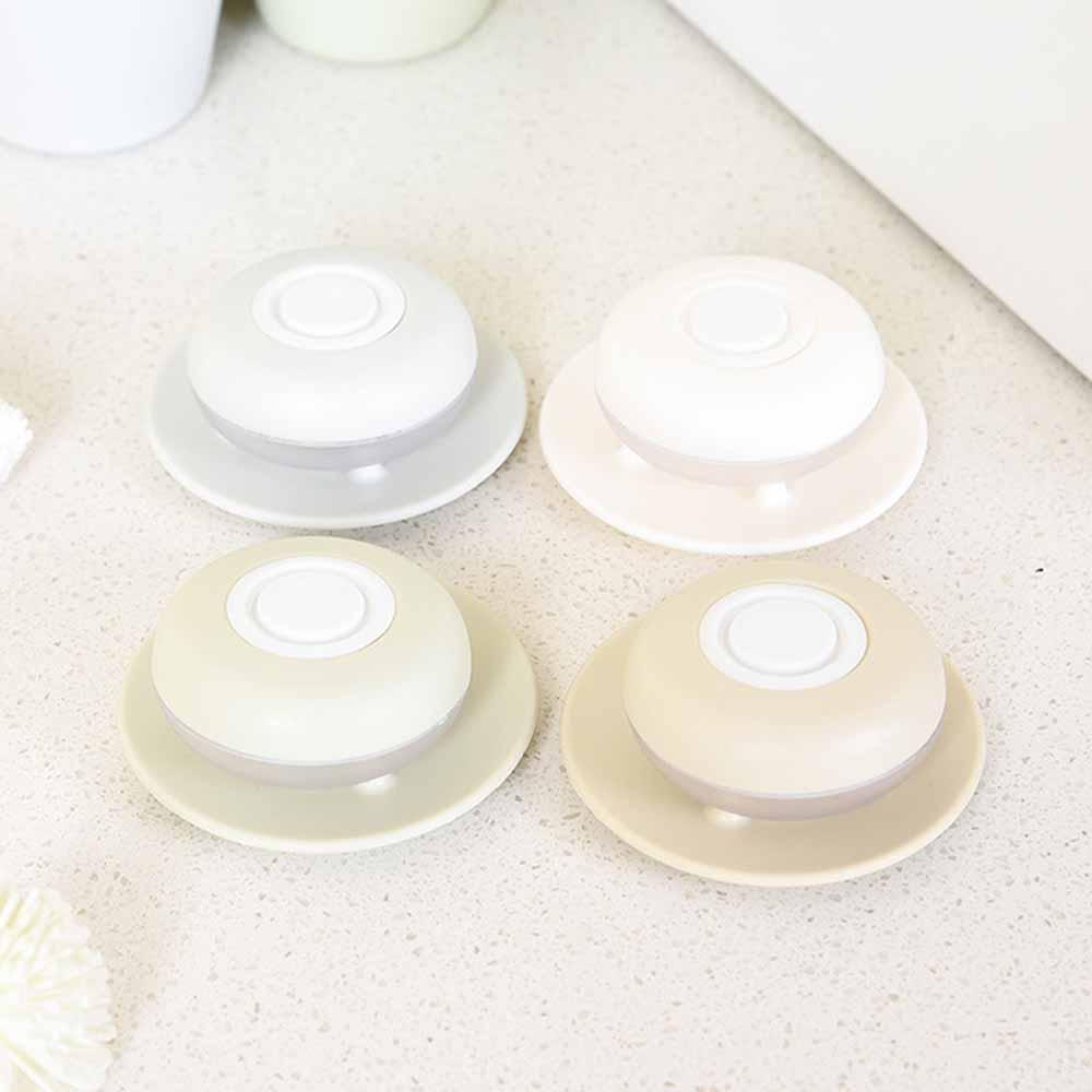 "Elegant läckagesäker reseförpackning, kompakt design, perfekt för handbagage, fyra färger, tillbehör resor."