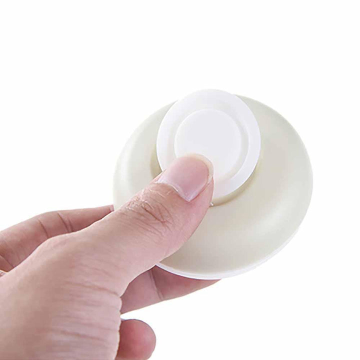 "Elegant läckagesäker reseförpackning, kompakt design, perfekt för handbagage, fyra färger, tillbehör resor."