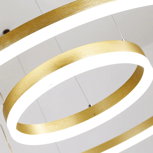Unik pendellampa i aluminium med integrerad LED. Sol- och måneinspiration för modern heminredning.