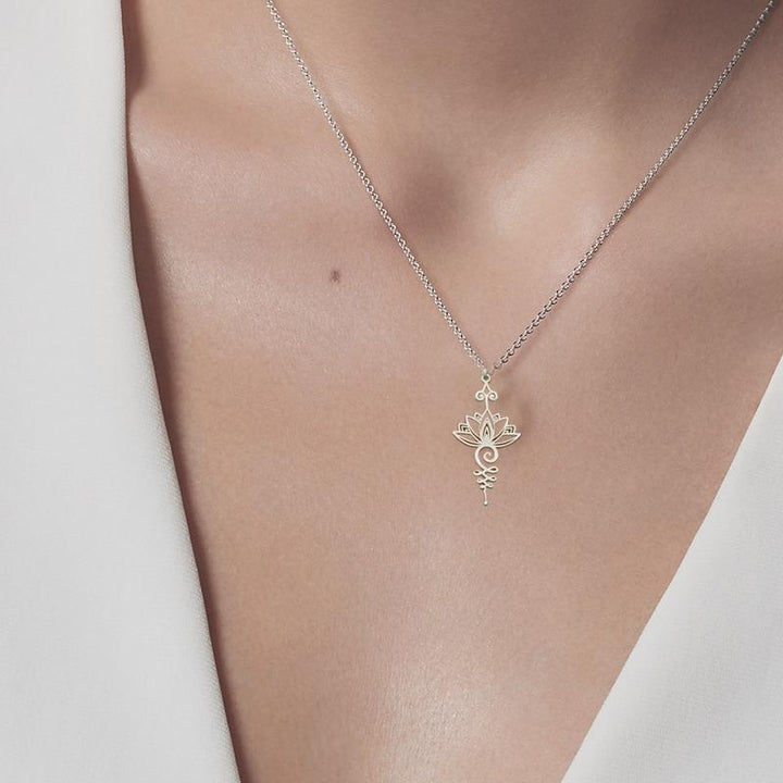 "Elegant lotusblomma halsband för kvinnor, hängande design i gyllene, silver och roséguld med glänsande finish och detaljrike