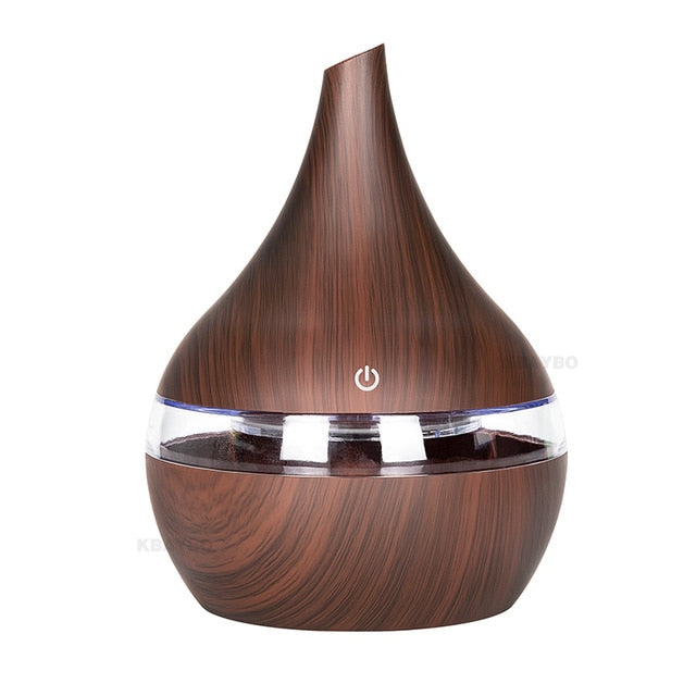 Avancerad luftfuktare med aromadiffuser och mjuk LED-lampa för mysig atmosfär och välbefinnande.