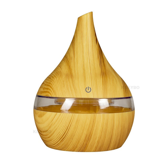 Produktbild: Elegant designad luftfuktare som även är en doftspridare med integrerad LED-lampa.