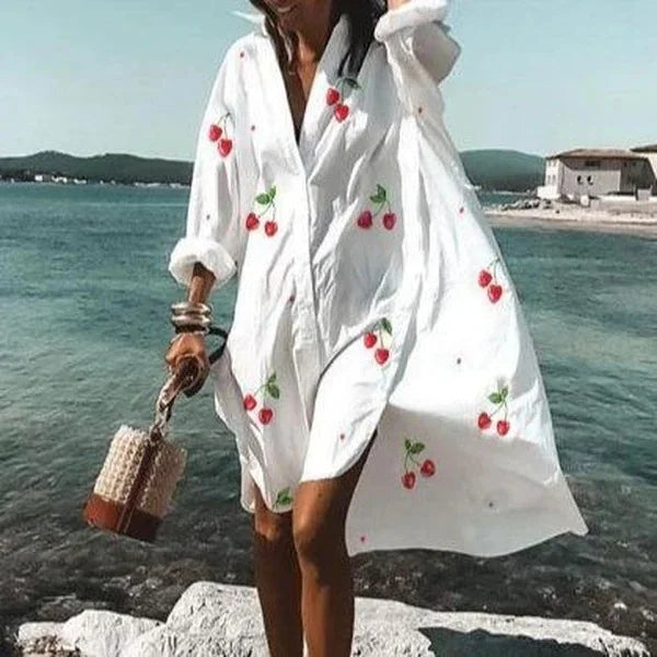 Stilren midi skjortklänning med polokrage för kvinnor, mönstrad design & bekvämt material.