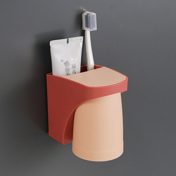 "Elegant magnetisk tandborsthållare med munvattenkopp i kompakt design, dammtät och vattentät för moderna badrum."