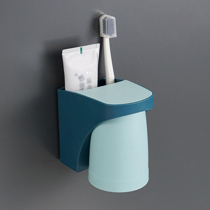 "Elegant magnetisk tandborsthållare med munvattenkopp i kompakt design, dammtät och vattentät för moderna badrum."