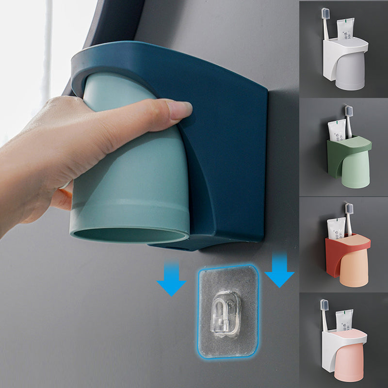 "Elegant magnetisk tandborsthållare med munvattenkopp i kompakt design, dammtät och vattentät för moderna badrum."