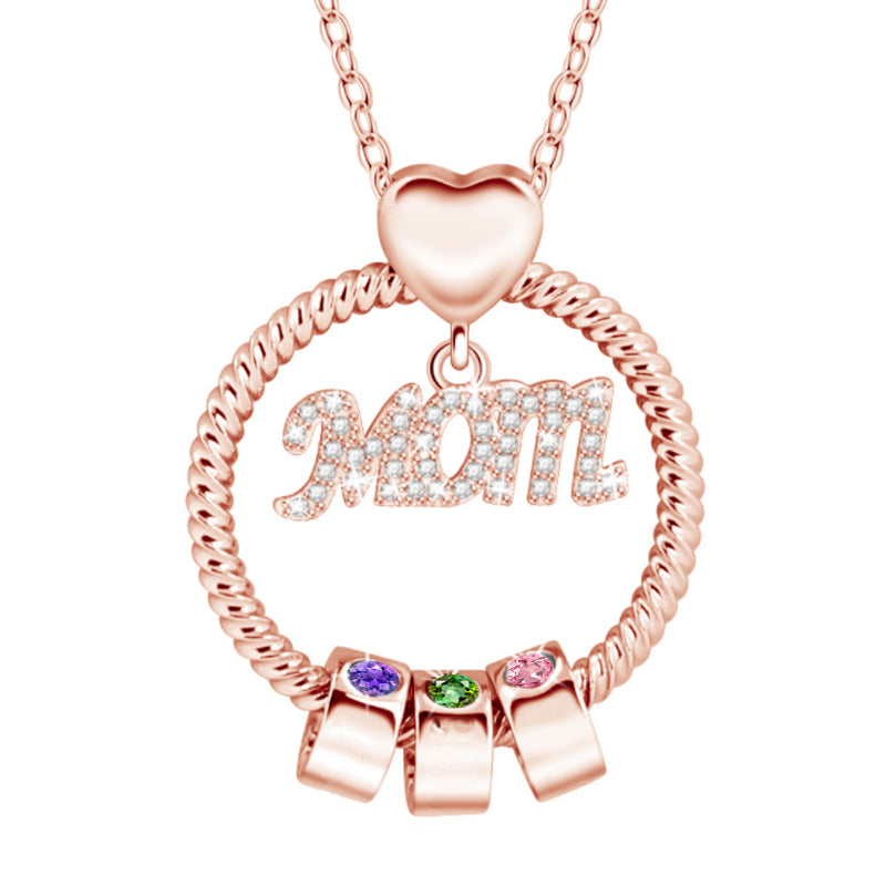 "Elegant mammas halsband med födelsesten i gyllene färg, intrikat hjärtdesign och tvinnad repdetalj för kvinnor."