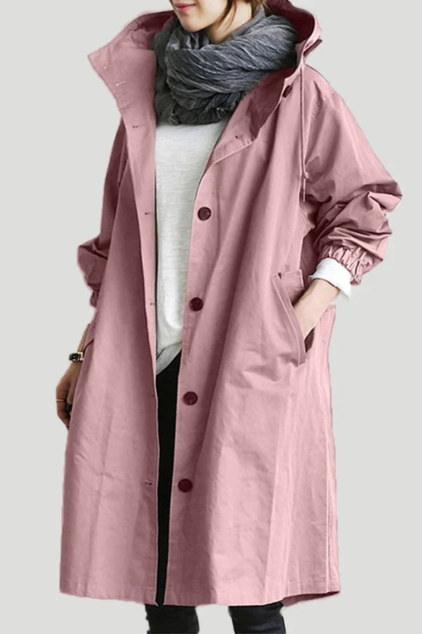 Maris vattentät regnkappa för dam. Oversized halvlång trenchcoat, praktisk & elegant i alla väder.