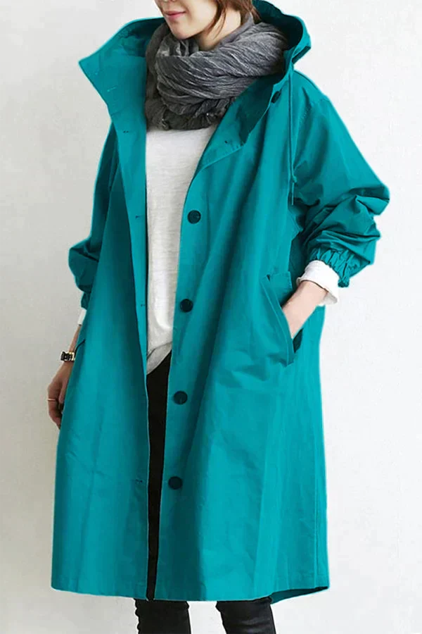 Elegant Maris halvlång damkappa. Oversized trenchcoat, tidlös design & bekväm passform för stilmedvetna.