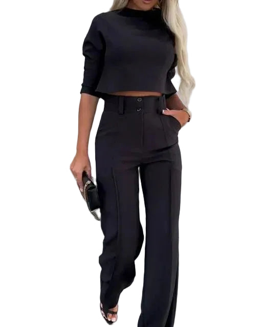 Elegant matchande set med en modern kort topp & högmidjade byxor i svart, perfekt för kontoret.