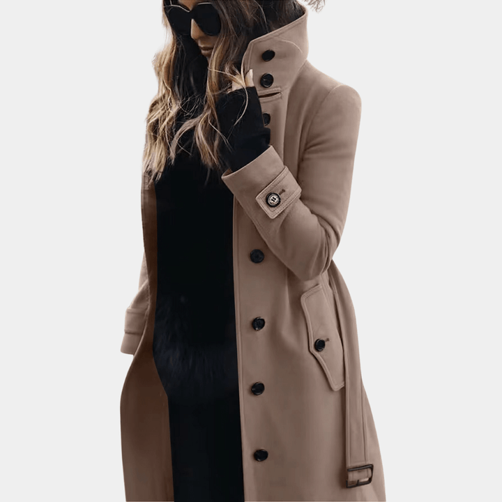 Elegant midjesydd trenchcoat för dam. Lång klassisk kappa, perfekt för höst och vinter.