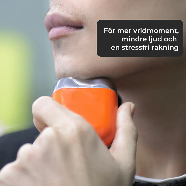 "Elegant mini rakapparat för män, kompakt design, svart färg, dubbel-flytande huvud för smidig rakning, idealisk för resor."