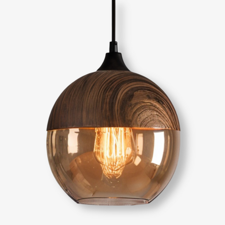 Elegant retro pendellampa i metall, nordisk design. Funktionell och stilren hemmabelysning.