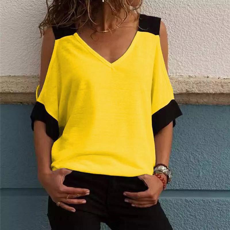 "Elegant off-shoulder V-ringad damblus i bomull, mjukt material med kontrasterande färger, perfekt för alla tillfällen."