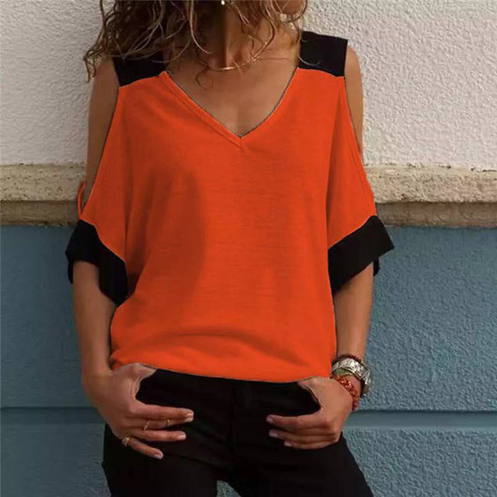 "Elegant off-shoulder V-ringad damblus i bomull, mjukt material med kontrasterande färger, perfekt för alla tillfällen."