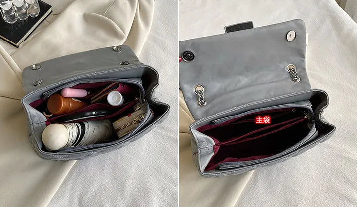Sofistikerad axelremsväska med quiltad yta. Ett elegant val för kvinnor som älskar mode och design.