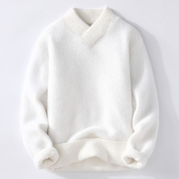 Elegant röd damtröja med V-ringning, perfekt för höst och vinter, i mjukt stickat material för en stilren look.