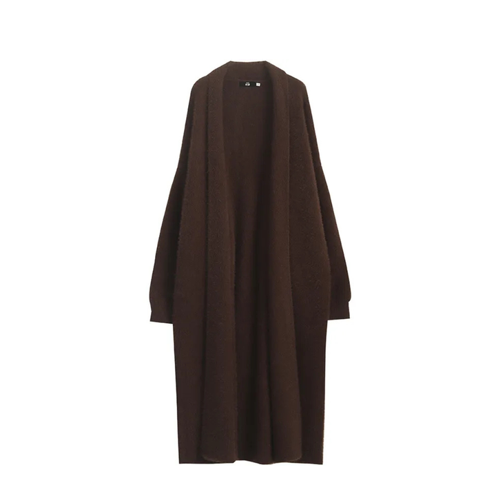 Modern vit långkofta för dam, öppen cardigan perfekt för lager på lager och vårens mode.