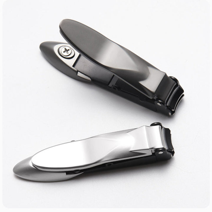 "Elegant rostfri nagelklippare med rakskarpa blad och självrengörande funktion, kompakt och stilren design."