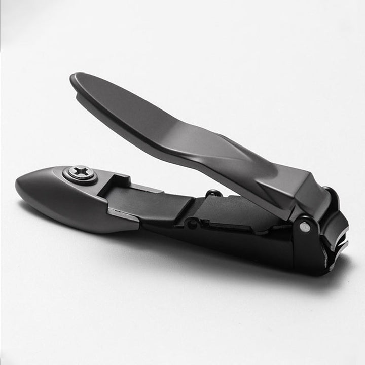 "Elegant rostfri nagelklippare med rakskarpa blad och självrengörande funktion, kompakt och stilren design."