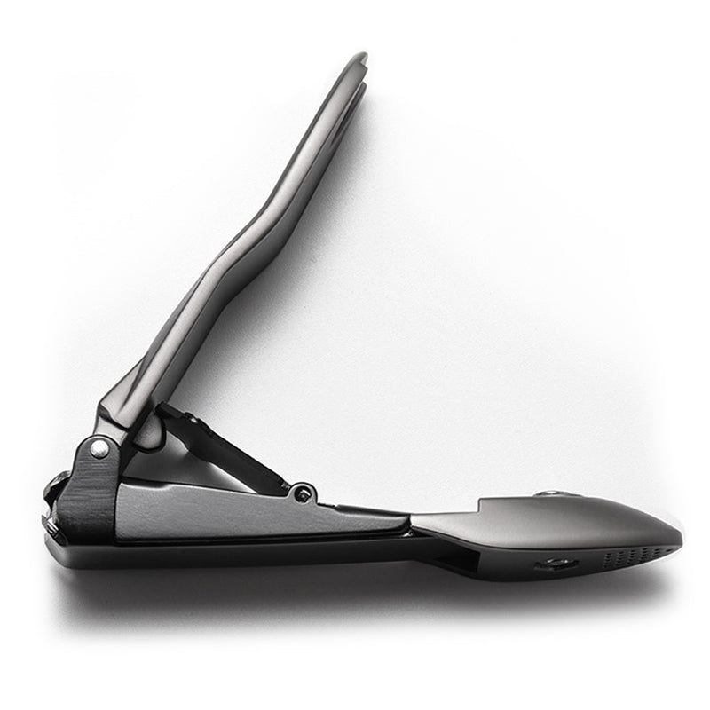 "Elegant rostfri nagelklippare med rakskarpa blad och självrengörande funktion, kompakt och stilren design."