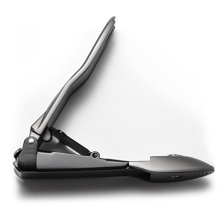 "Elegant rostfri nagelklippare med rakskarpa blad och självrengörande funktion, kompakt och stilren design."