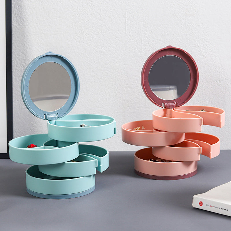 "Elegant roterande smyckesskrin med flera lager, spegel och LED-belysning för smidig och lyxig smyckesförvaring."