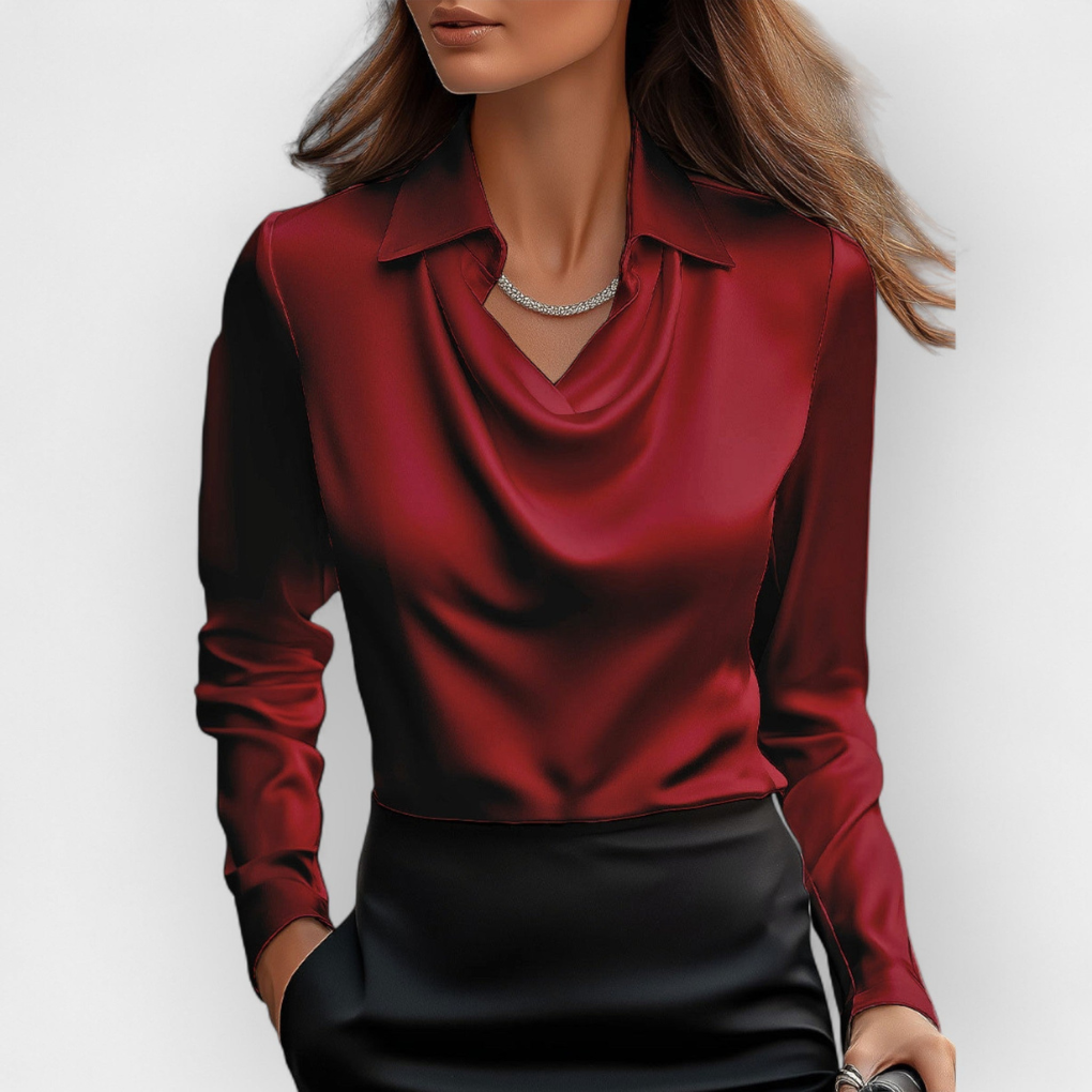Modeinriktad satinblus för kvinnor. Elegant skjorta med vattenfallskrage, idealisk för kontor och fest.