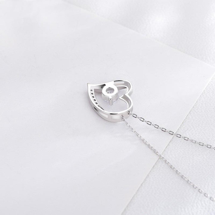 "Elegant silver hjärta halsband för damer med glittrande zirkon samt tidlös design, perfekt som romantisk gåva."