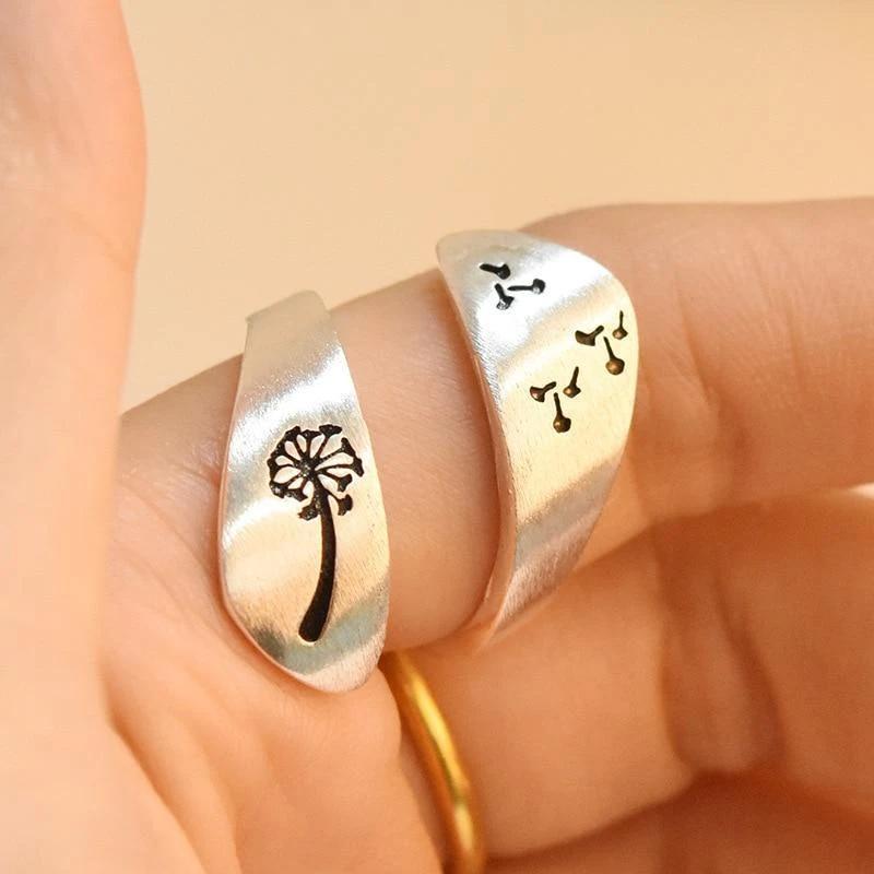 "Elegant silver Nature Art ring med justerbar design, med maskros och fjällmotiv, för män och kvinnor."