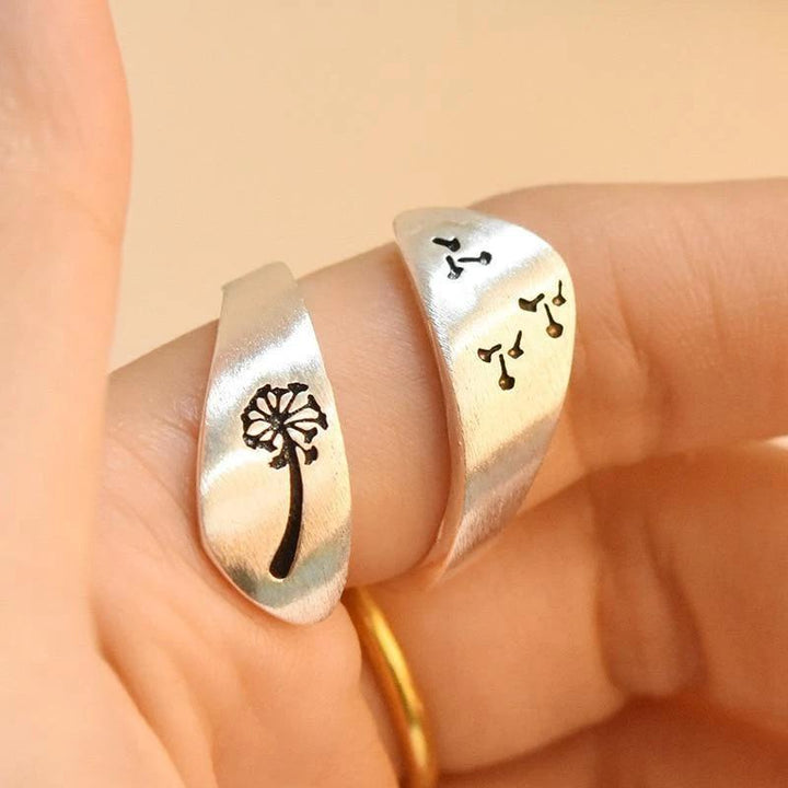 "Elegant silver Nature Art ring med justerbar design, med maskros och fjällmotiv, för män och kvinnor."