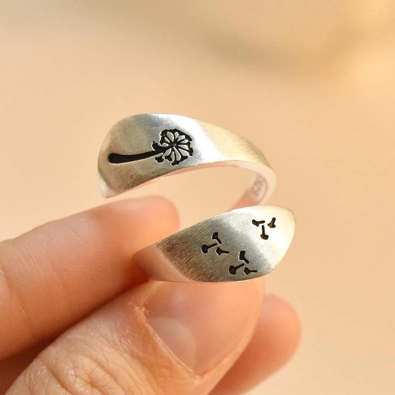 "Elegant silver Nature Art ring med justerbar design, med maskros och fjällmotiv, för män och kvinnor."